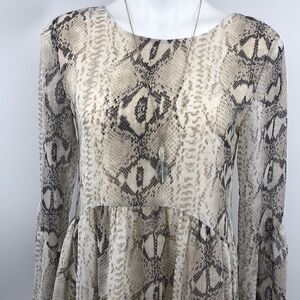 Adrienne snake print bell sleeve scoop back dress